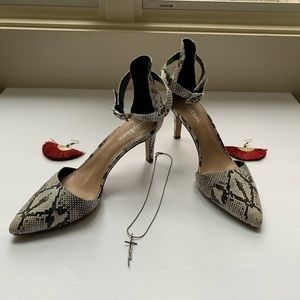 Kelly and Katie snake skin heel size: 10 M